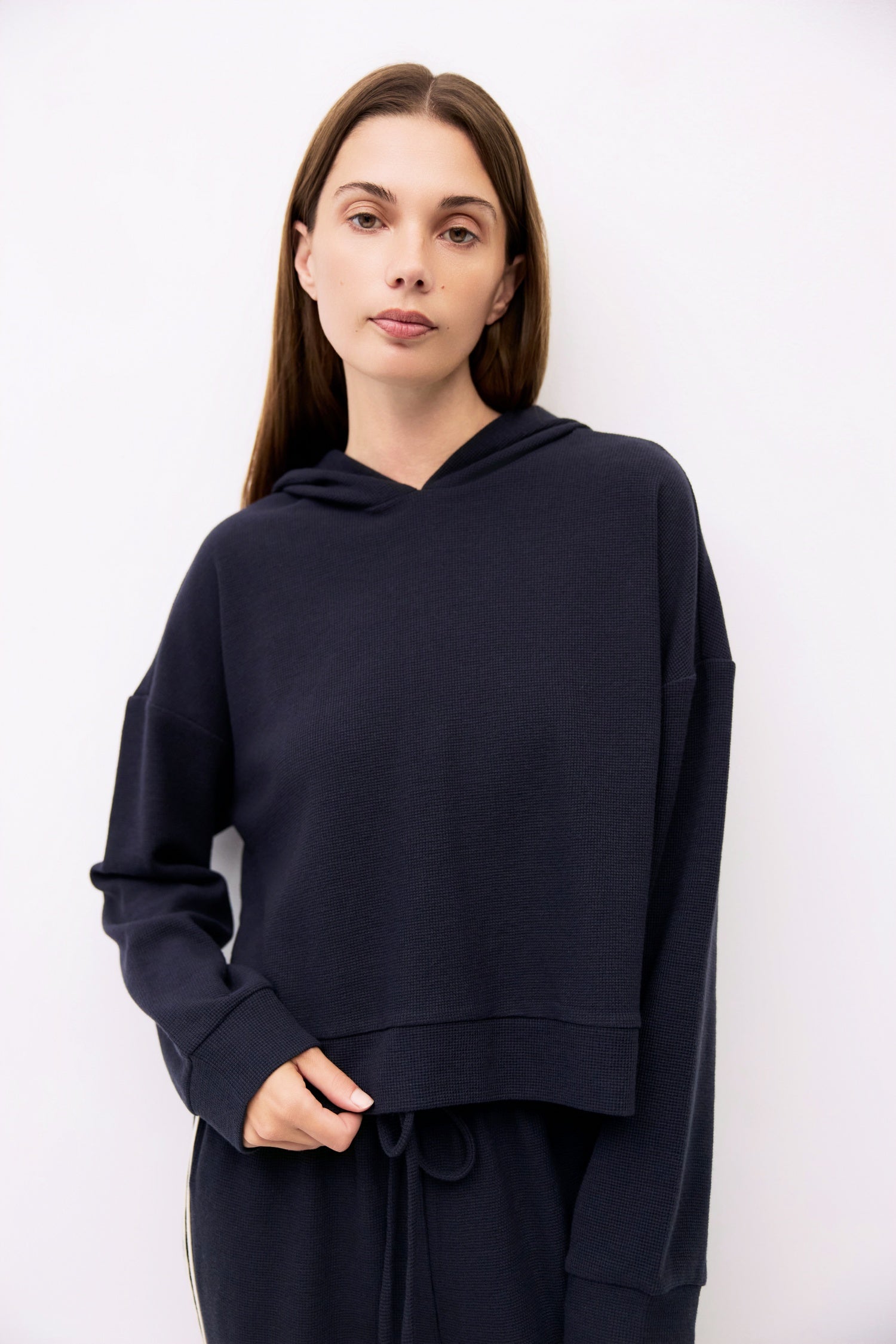 9084506472669, The Enzo Hoodie, Outerwear, All Row, All Row,allrow,Casual,cf-size-l,cf-size-m,cf-vendor-all-row,Cropped,cropped hemline,drop shoulder,Drop Shoulder Sleeve,Everyday,genderless,Hoodie,Minimal,minimalist,new,Outerwear,Polyester,Relaxed,Relaxed Fit,Ribbed,Ribbed Details,Ribbed Fabric,Spring,Sweater,Transitional,versatile,waffle knit,Womens,womens top, Information The Enzo Hoodie combines cozy midweight waffle knit with a relaxed fit and drop shoulders for effortless comfort. Finished with a hood