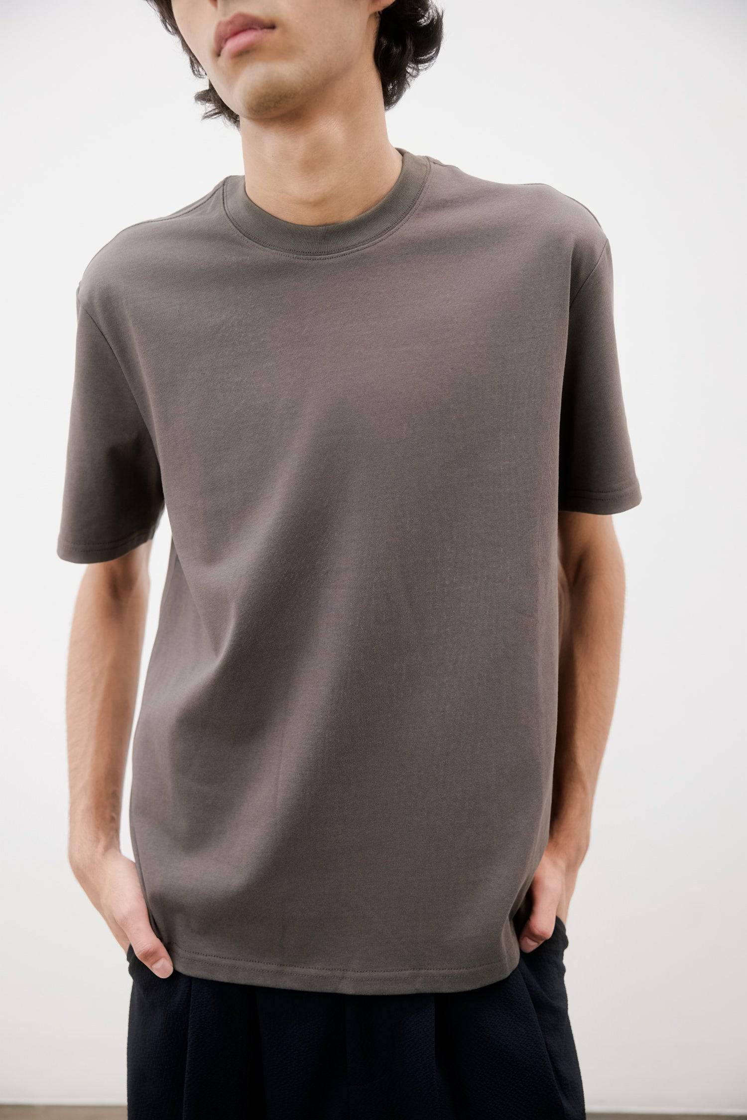 9094387925213, The Colin Top, Tops, Common Market, Basics,Black,Blue,Casual,cf-color-black,cf-color-white,cf-size-l,cf-size-m,cf-size-s,cf-size-xl,cf-size-xxl,cf-vendor-common-market,Charcoal,Comfortable,Everyday,Grey,Heather Grey,Men's,Ribbed,Ribbed Fabric,Ribbed Top,Short Sleeve,Solid,T-Shirt,Tee,Tops, Information The Colin Top is a relaxed-fit tee crafted from midweight cotton jersey for soft, everyday comfort. Featuring a classic crewneck and short sleeves, it’s a versatile essential for any wardrobe. D