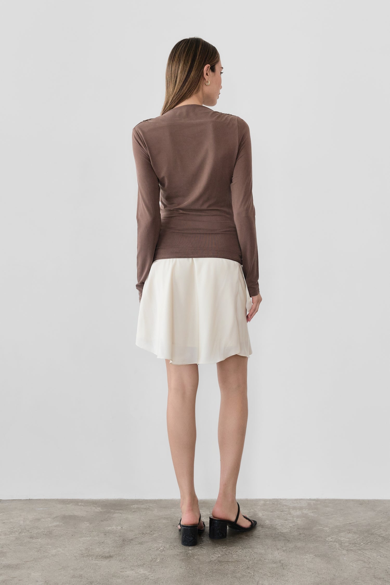 8809551921373, The Calix Top, Tops, All Row, All Row,allrow,brown,Casual,cf-color-black,cf-color-brown,cf-size-l,cf-size-m,cf-size-s,cf-vendor-all-row,Fall,Fitted Top,knit,Knit Top,layer,layering,Layers,Long Sleeve Top,Mock neck,modal,new,Shirred Bodice,Short Sleeve,thin,Tops,Transitional,Winter,Women's,womens top, Information The Calix Top is a mock neck long-sleeve top crafted from a washed modal fabrication offering a soft and comfortable feel. The fitted bodice and straight neckline create a flattering 
