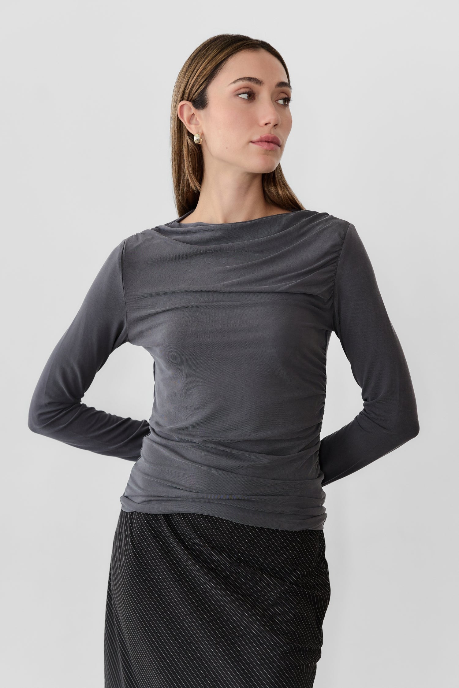 8809551921373, The Calix Top, Tops, All Row, All Row,allrow,brown,Casual,cf-color-black,cf-color-brown,cf-size-l,cf-size-m,cf-size-s,cf-vendor-all-row,Fall,Fitted Top,knit,Knit Top,layer,layering,Layers,Long Sleeve Top,Mock neck,modal,new,Shirred Bodice,Short Sleeve,thin,Tops,Transitional,Winter,Women's,womens top, Information The Calix Top is a mock neck long-sleeve top crafted from a washed modal fabrication offering a soft and comfortable feel. The fitted bodice and straight neckline create a flattering 
