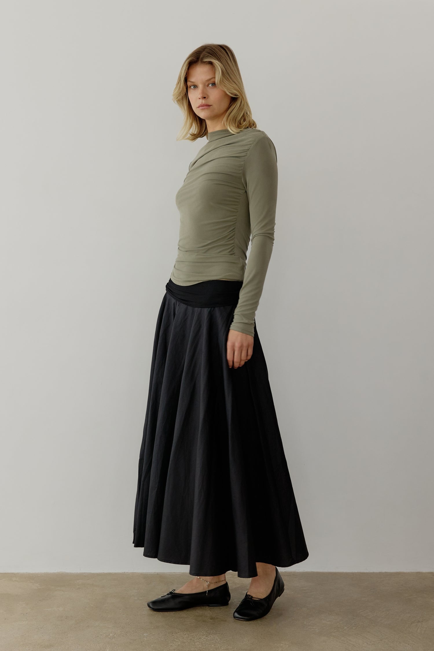 8809551921373, The Calix Top, Tops, All Row, All Row,allrow,brown,Casual,cf-color-black,cf-color-brown,cf-size-l,cf-size-m,cf-size-s,cf-vendor-all-row,Fall,Fitted Top,knit,Knit Top,layer,layering,Layers,Long Sleeve Top,Mock neck,modal,new,Shirred Bodice,Short Sleeve,thin,Tops,Transitional,Winter,Women's,womens top, Information The Calix Top is a mock neck long-sleeve top crafted from a washed modal fabrication offering a soft and comfortable feel. The fitted bodice and straight neckline create a flattering 