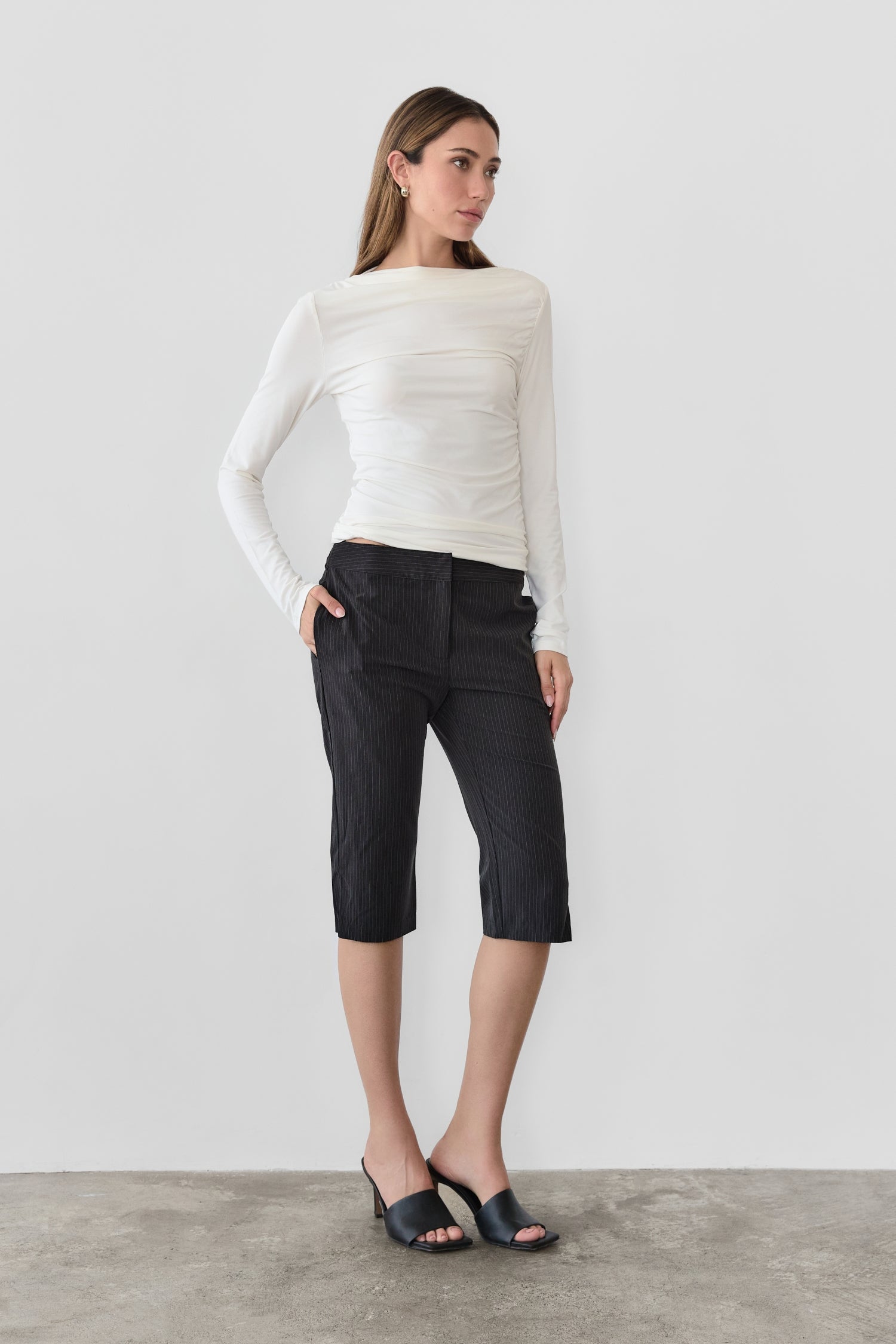 8809551921373, The Calix Top, Tops, All Row, All Row,allrow,brown,Casual,cf-color-black,cf-color-brown,cf-size-l,cf-size-m,cf-size-s,cf-vendor-all-row,Fall,Fitted Top,knit,Knit Top,layer,layering,Layers,Long Sleeve Top,Mock neck,modal,new,Shirred Bodice,Short Sleeve,thin,Tops,Transitional,Winter,Women's,womens top, Information The Calix Top is a mock neck long-sleeve top crafted from a washed modal fabrication offering a soft and comfortable feel. The fitted bodice and straight neckline create a flattering 