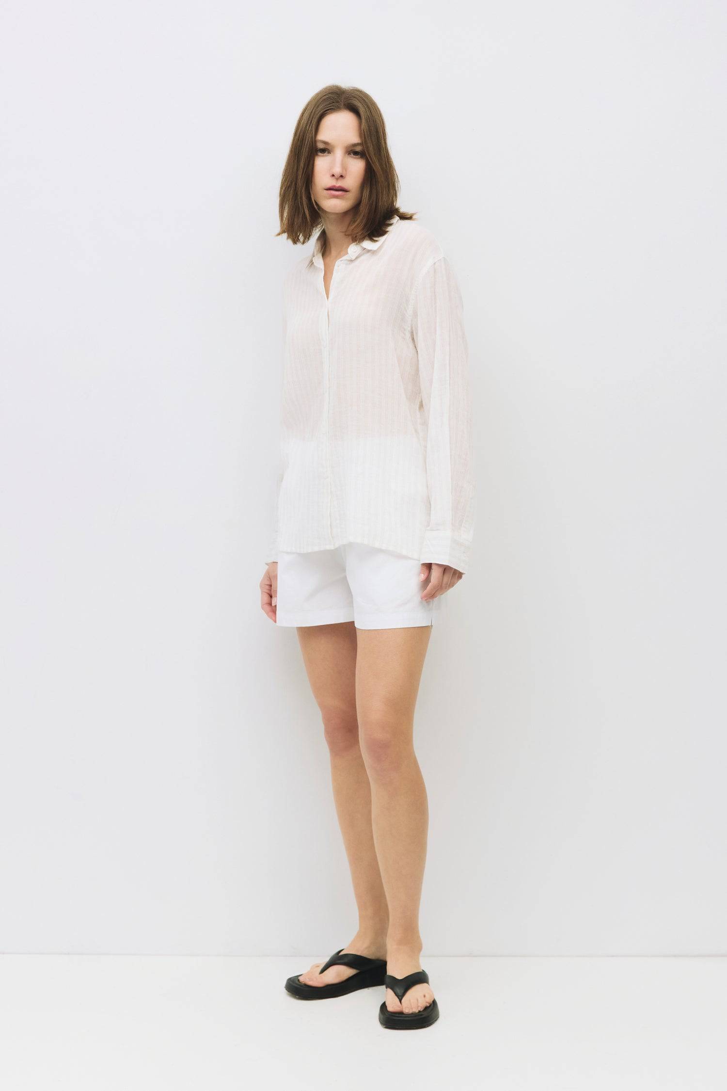 8983744217309, The Frazier Top, Tops, All Row, Black,Breathable,Button down,Button Down Shirt,Button Up,Casual,cf-color-black,cf-color-blue,cf-color-white,cf-size-l,cf-size-m,cf-size-s,cf-vendor-mod-ref,cinched,Cinched Back,Cinched Waist,collared,Collared Top,Cotton,everyday,Long Sleeve,Long Sleeve Top,new,Oversized,spring,Striped,Summer,Tops,Transitional,white,womens,Work,Workwear, Information The Frazier Top is a lightweight, button-down shirt with a boyfriend fit and a classic collar neckline. Its semi-s