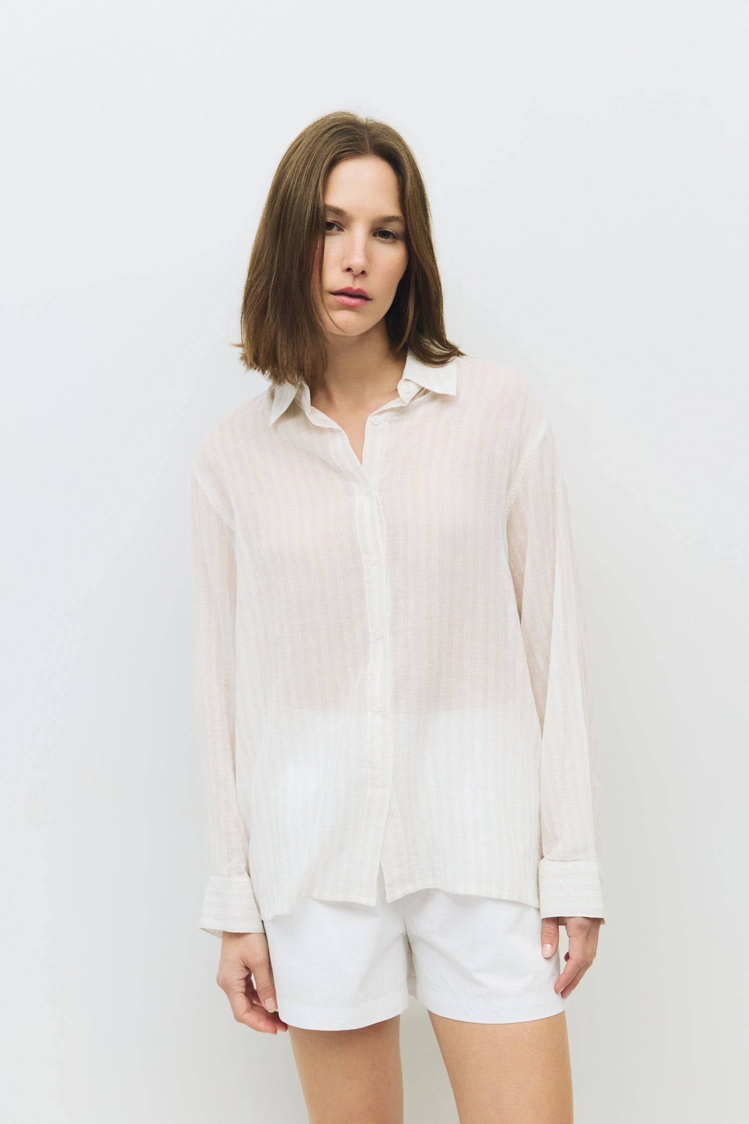 8983744217309, The Frazier Top, Tops, All Row, Black,Breathable,Button down,Button Down Shirt,Button Up,Casual,cf-color-black,cf-color-blue,cf-color-white,cf-size-l,cf-size-m,cf-size-s,cf-vendor-mod-ref,cinched,Cinched Back,Cinched Waist,collared,Collared Top,Cotton,everyday,Long Sleeve,Long Sleeve Top,new,Oversized,spring,Striped,Summer,Tops,Transitional,white,womens,Work,Workwear, Information The Frazier Top is a lightweight, button-down shirt with a boyfriend fit and a classic collar neckline. Its semi-s