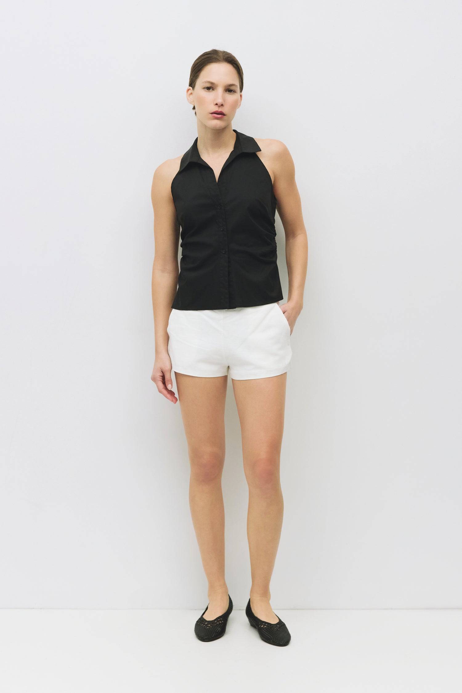 8984827855069, The Cambria Top, Tops, Mod Ref, Black,Breathable,Button down,Button Down Shirt,Button Up,Casual,cf-color-black,cf-color-blue,cf-color-white,cf-size-l,cf-size-m,cf-size-s,cf-vendor-mod-ref,cinched,Cinched Back,Cinched Waist,collared,Collared Top,Cotton,everyday,final-sale,finalsale,Long Sleeve,Long Sleeve Top,new,Oversized,sale,spring,Striped,Summer,Tops,Transitional,white,womens,Work,Workwear, Information The Cambria Top features a flattering halter neckline and a button-down front for a styl