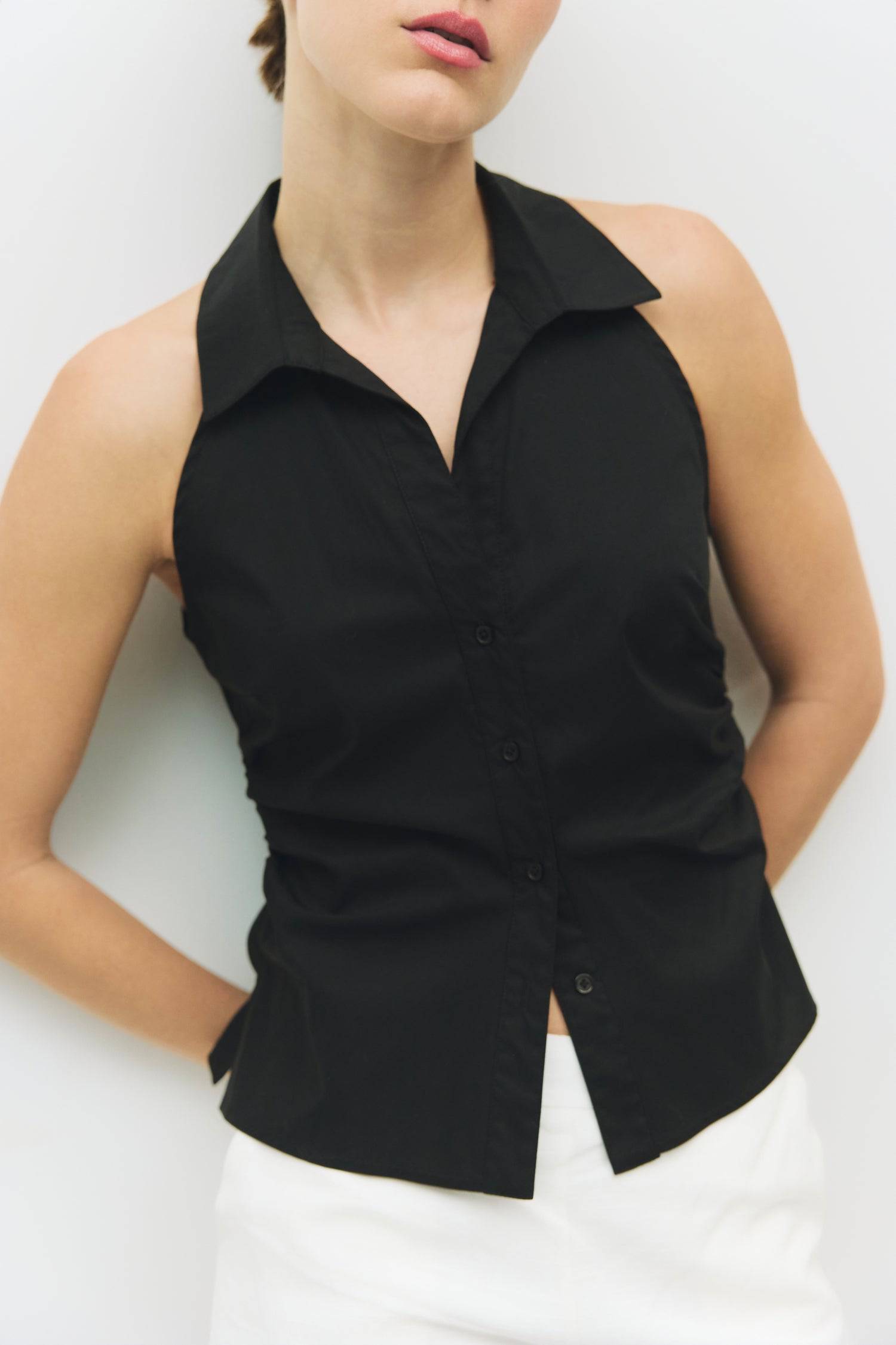 8984827855069, The Cambria Top, Tops, Mod Ref, Black,Breathable,Button down,Button Down Shirt,Button Up,Casual,cf-color-black,cf-color-blue,cf-color-white,cf-size-l,cf-size-m,cf-size-s,cf-vendor-mod-ref,cinched,Cinched Back,Cinched Waist,collared,Collared Top,Cotton,everyday,final-sale,finalsale,Long Sleeve,Long Sleeve Top,new,Oversized,sale,spring,Striped,Summer,Tops,Transitional,white,womens,Work,Workwear, Information The Cambria Top features a flattering halter neckline and a button-down front for a styl