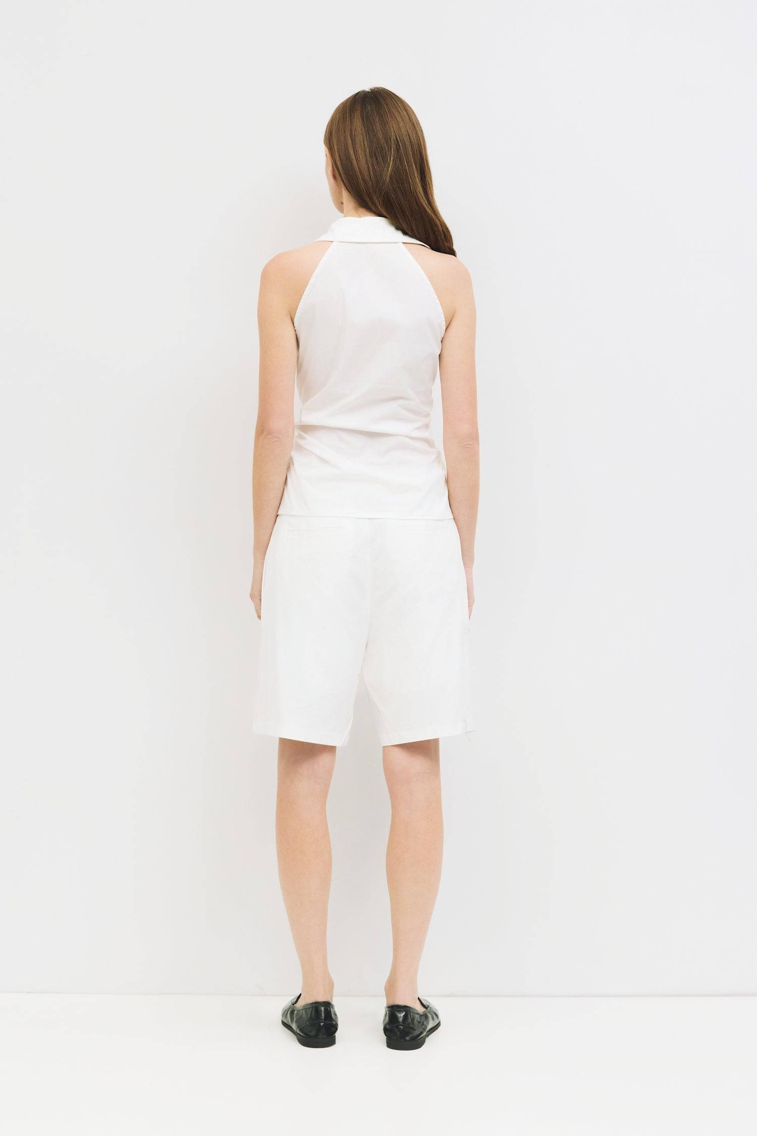 8984827855069, The Cambria Top, Tops, Mod Ref, Black,Breathable,Button down,Button Down Shirt,Button Up,Casual,cf-color-black,cf-color-blue,cf-color-white,cf-size-l,cf-size-m,cf-size-s,cf-vendor-mod-ref,cinched,Cinched Back,Cinched Waist,collared,Collared Top,Cotton,everyday,final-sale,finalsale,Long Sleeve,Long Sleeve Top,new,Oversized,sale,spring,Striped,Summer,Tops,Transitional,white,womens,Work,Workwear, Information The Cambria Top features a flattering halter neckline and a button-down front for a styl