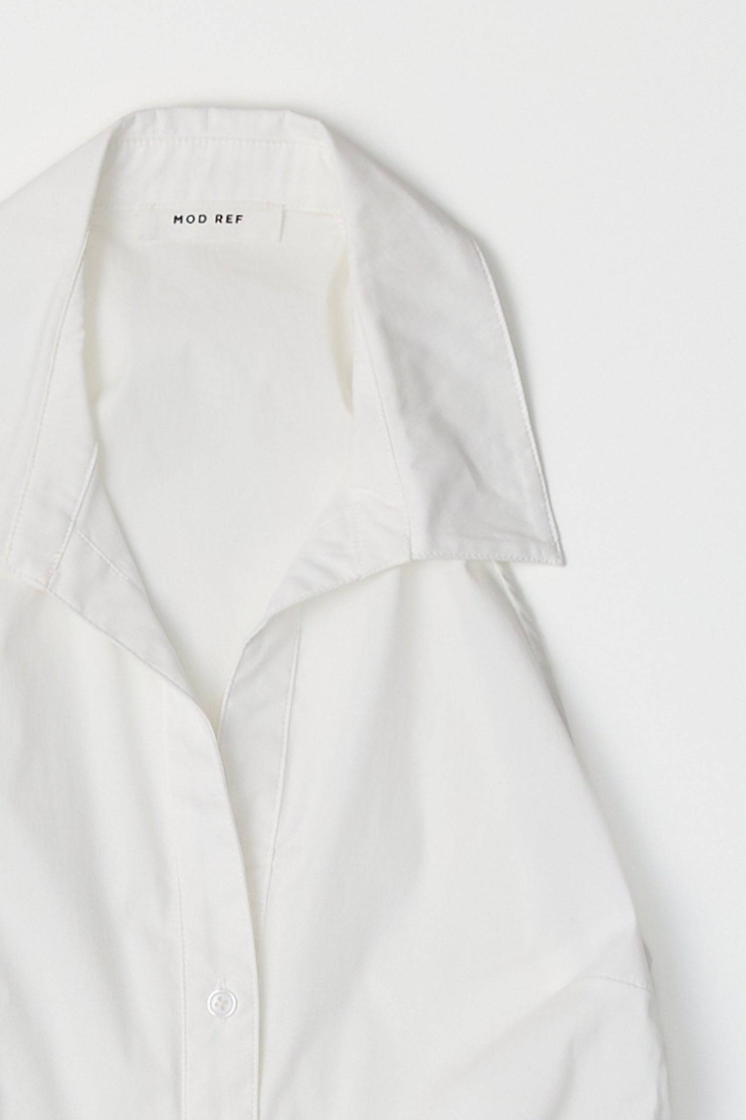 8984827855069, The Cambria Top, Tops, Mod Ref, Black,Breathable,Button down,Button Down Shirt,Button Up,Casual,cf-color-black,cf-color-blue,cf-color-white,cf-size-l,cf-size-m,cf-size-s,cf-vendor-mod-ref,cinched,Cinched Back,Cinched Waist,collared,Collared Top,Cotton,everyday,final-sale,finalsale,Long Sleeve,Long Sleeve Top,new,Oversized,sale,spring,Striped,Summer,Tops,Transitional,white,womens,Work,Workwear, Information The Cambria Top features a flattering halter neckline and a button-down front for a styl