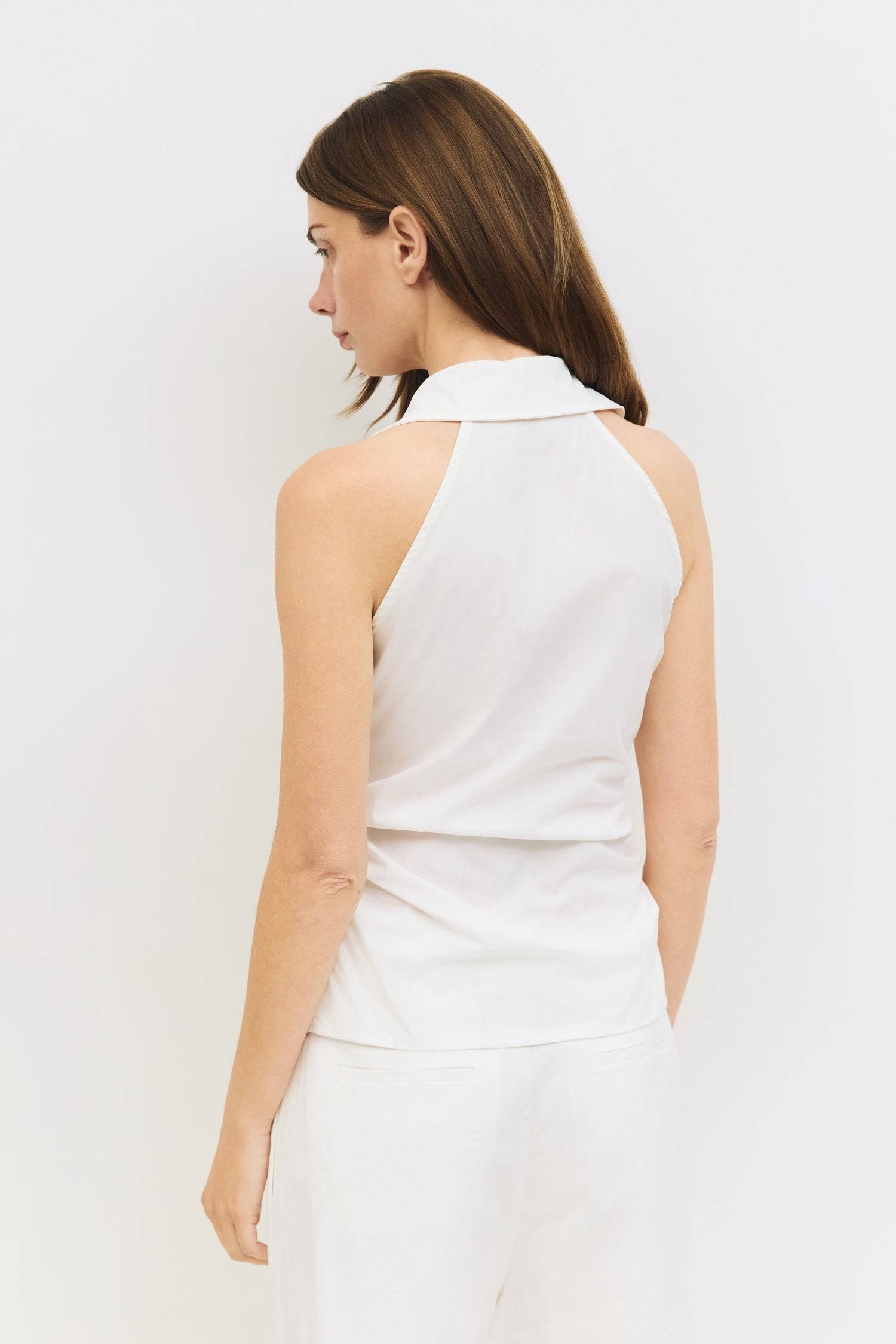 8984827855069, The Cambria Top, Tops, Mod Ref, Black,Breathable,Button down,Button Down Shirt,Button Up,Casual,cf-color-black,cf-color-blue,cf-color-white,cf-size-l,cf-size-m,cf-size-s,cf-vendor-mod-ref,cinched,Cinched Back,Cinched Waist,collared,Collared Top,Cotton,everyday,final-sale,finalsale,Long Sleeve,Long Sleeve Top,new,Oversized,sale,spring,Striped,Summer,Tops,Transitional,white,womens,Work,Workwear, Information The Cambria Top features a flattering halter neckline and a button-down front for a styl